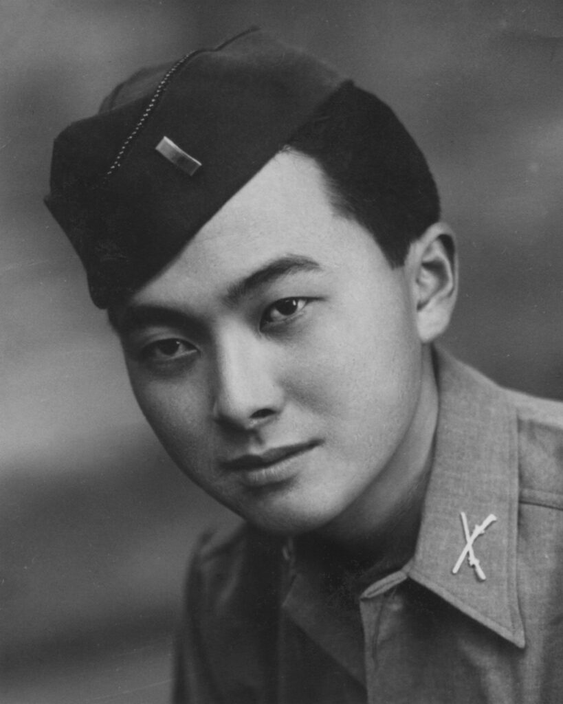 Historic black-and-white photograph of First Lieutenant Daniel Inouye in military uniform during World War II.