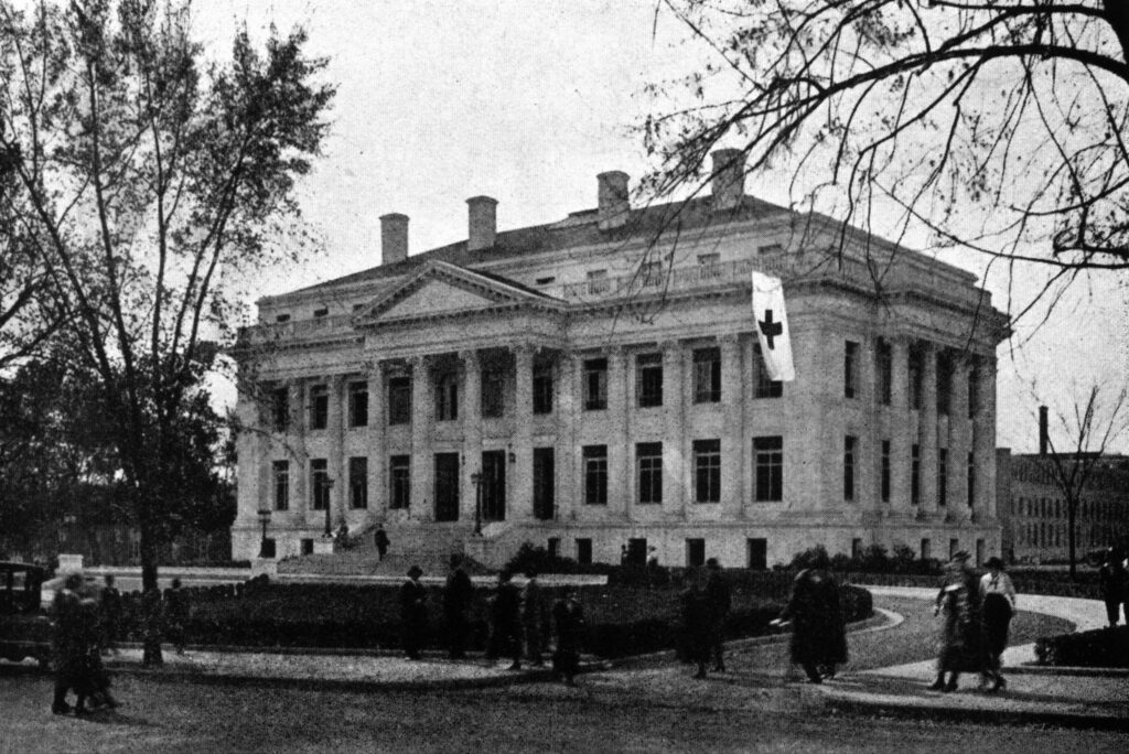 Exterior view of the American Red Cross national headquarters building in Washington, D.C., featuring neoclassical architecture and broad stone steps