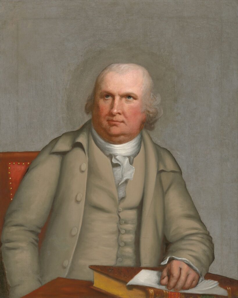 Portrait of Robert Morris, shown seated in formal attire in a painted copy after an original portrait by Robert Edge Pine. The 1820 artwork depicts Morris facing slightly to the viewer’s left with a composed expression against a dark background. Image courtesy of the National Portrait Gallery.