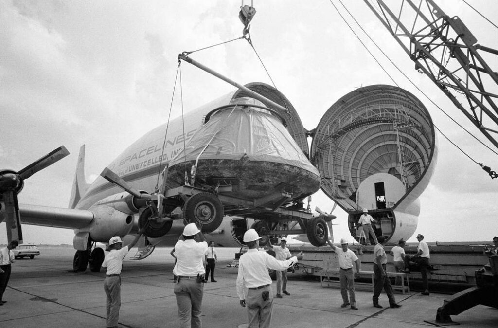 The Apollo 11 Command Module Columbia on display, showing the cone-shaped spacecraft that carried the crew to lunar orbit and back to Earth.