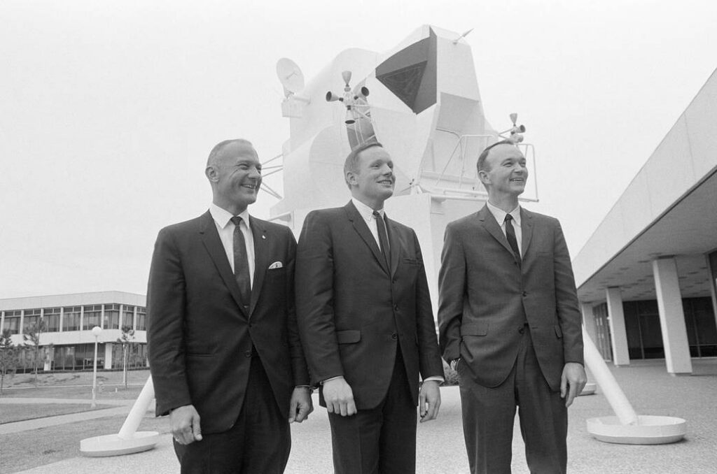 Black and white portrait of Apollo 11 astronauts Neil Armstrong, Michael Collins, and Buzz Aldrin.