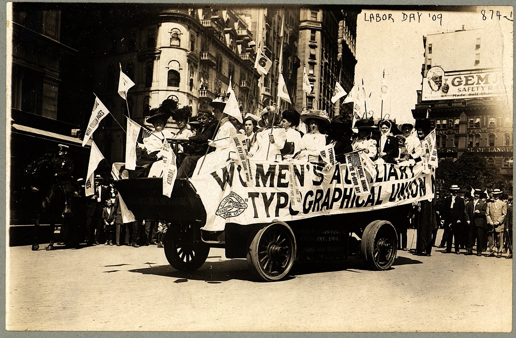 Women ride on a float for the Women's Auxiliary Typographical Union during New York City's Labor Day parade, September 6, 1909.